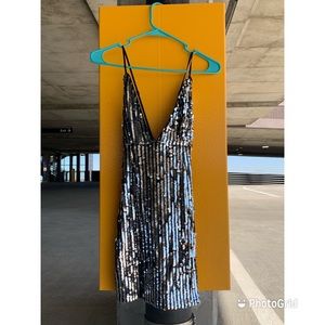 Black and silver, eye catching, modern, night out with the girls dress. Size: 0